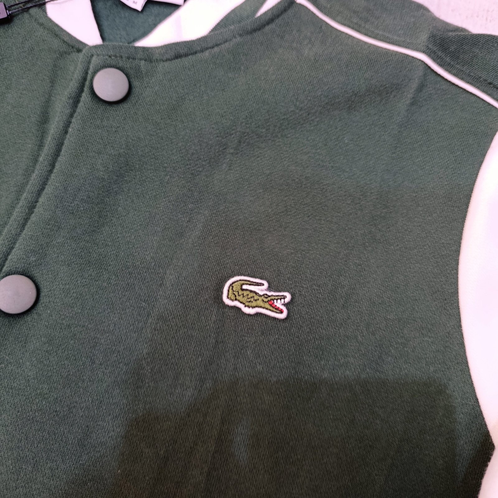 Chaqueta universitaria Lacoste verde y blanca algodón